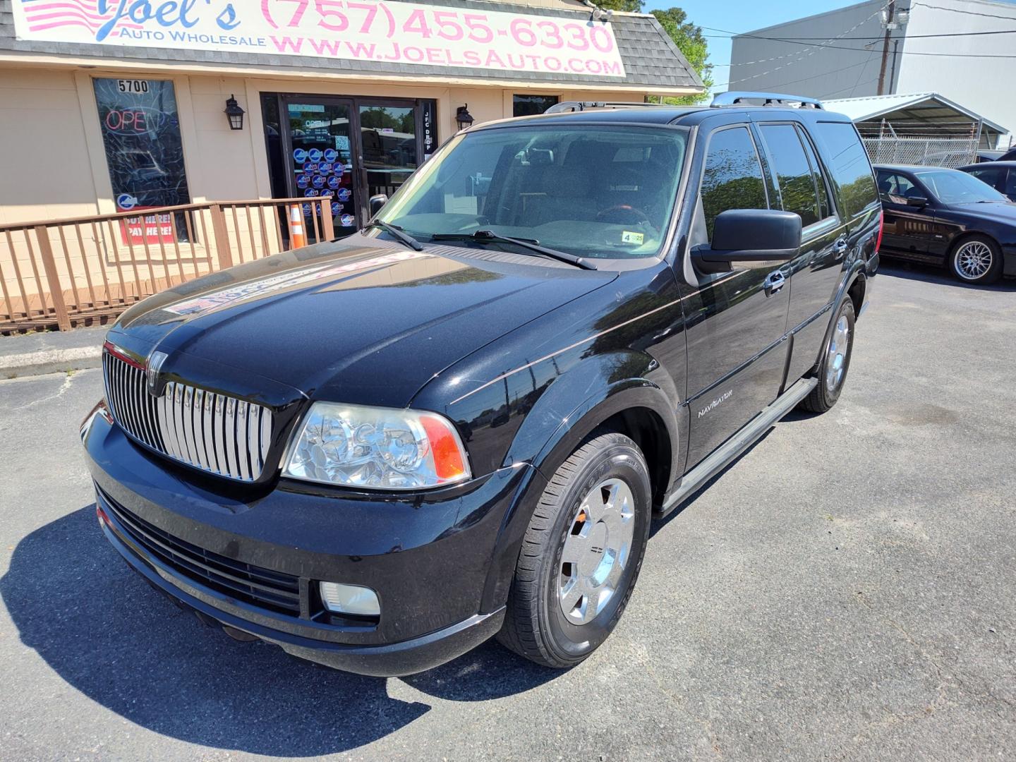 2006 Black /tan Lincoln Navigator 4WD Luxury (5LMFU28546L) with an 5.4L V8 SOHC 24V engine, 6-Speed Automatic Overdrive transmission, located at 5700 Curlew Drive, Norfolk, VA, 23502, (757) 455-6330, 36.841885, -76.209412 - Photo#5